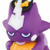 A Toxel figure with a witch hat and a jack-o-lantern.